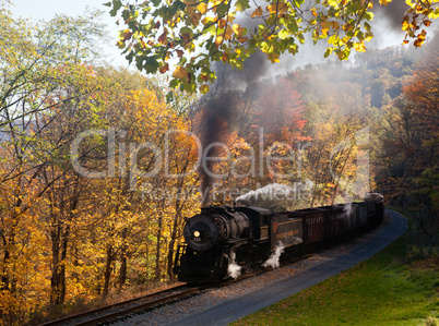 WM Steam train powers along railway