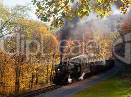 WM Steam train powers along railway