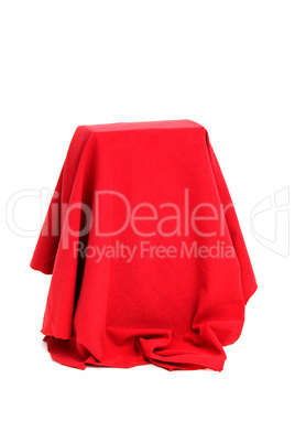 mysterious box coverd with red drapery