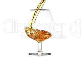 filling a glass of brandy