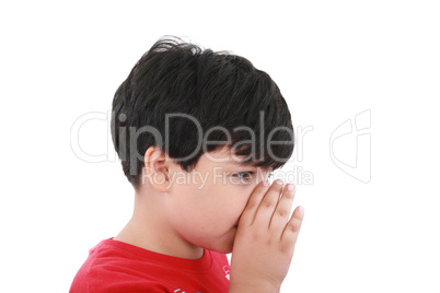a boy is telling a secret with a hand symbol