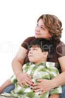 little boy looking something interesting to his mother against w