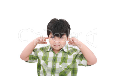 Photo of a boy with his fingers in his ears.