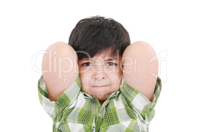 Close up portrait of a young boy child smiling with arms up behi