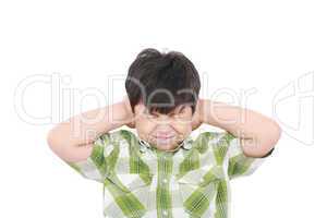 Little boy closing his eyes and ears with his hands, isolated on