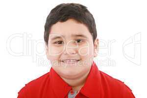 Boy looking at the camera with a small smile over white backgrou