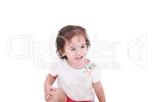 Closeup of adorable little girl smiling cheerfully