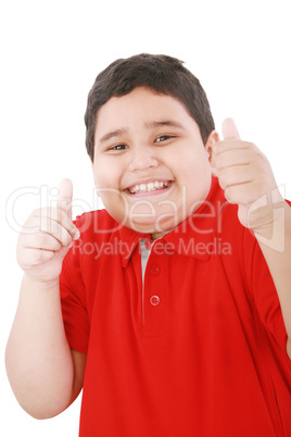 Thumbs up shown by a happy young boy