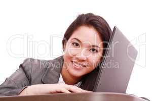 Young business woman on a laptop - isolated on white
