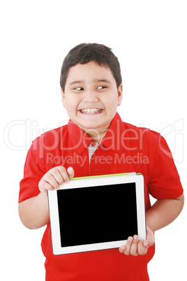 Portrait of a cute young child happy with his new digital tablet