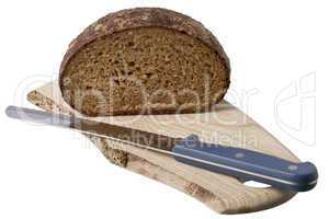brown bread on shelf with knife