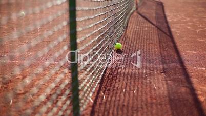 Tennis Balls Bounces of the Net