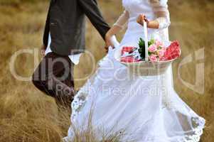 Bride and groom running