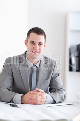 Close up of architect with folded hands