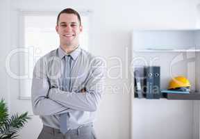 Businessman standing and smiling