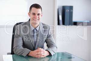 Smiling businessman in a meeting