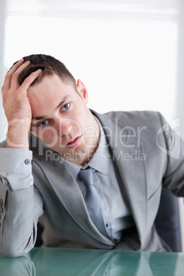 Close up of young businessman after getting bad news
