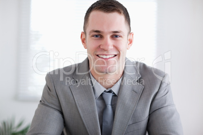 Close up of smiling businessman