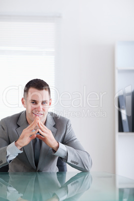 Close up of young businessman in a successful negotiation