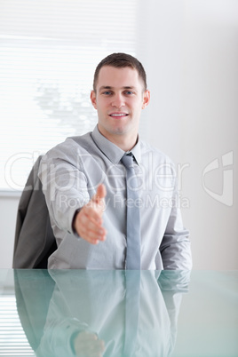 Close up of businessman greeting his negotiation partner