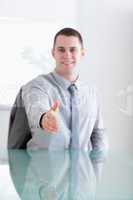 Close up of smiling businessman greeting his negotiation partner