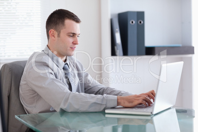 Businessman using his laptop