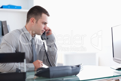 Businessman answering the phone