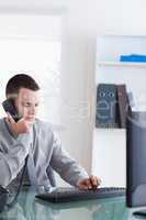 Businessman listening to caller