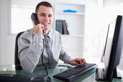Businessman having a dialogue on the phone
