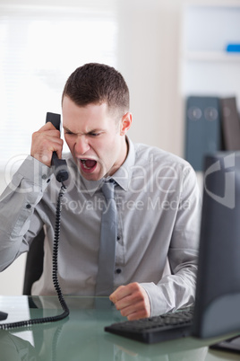 Angry businessman on the phone