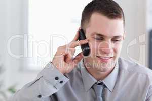 Businessman listening closely yo caller