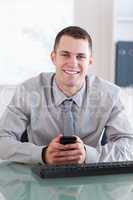 Close up of businessman getting a text message