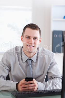 Close up of businessman with cellphone