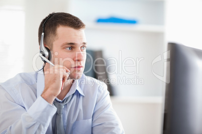 Call center agent speaking with costumer