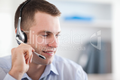 Close up of call center agent talking with costumer