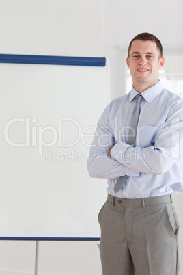 Smiling businessman giving a presentation