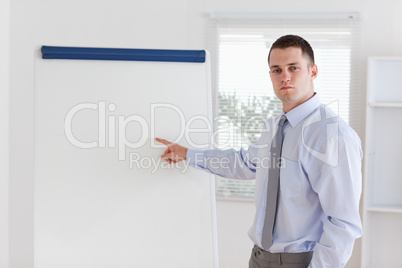 Businessman explaining the flip chart
