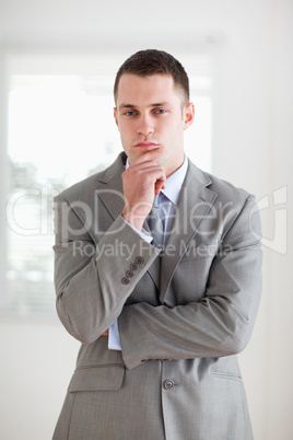 Thinking confident businessman