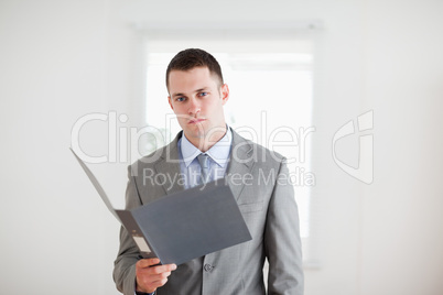 Businessman with open folder