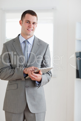 Businessman pointing at his notes