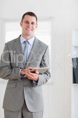 Young businessman with notes
