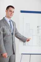 Businessman pointing at chart
