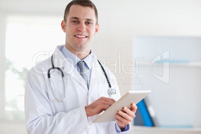 Doctor with his tablet
