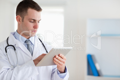 Doctor with tablet