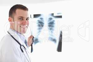 Smiling doctor with x-ray
