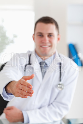 Doctor offering his hand