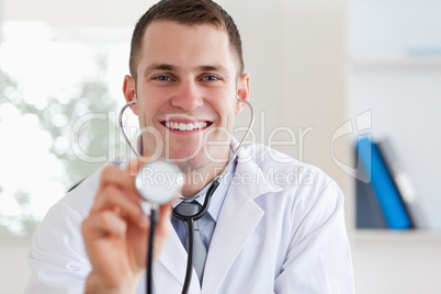 Smiling doctor with stethoscope