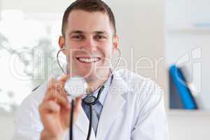Smiling doctor with stethoscope