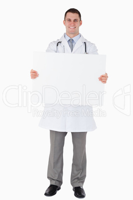 Doctor holding a sign