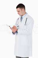 Doctor carefully taking notes